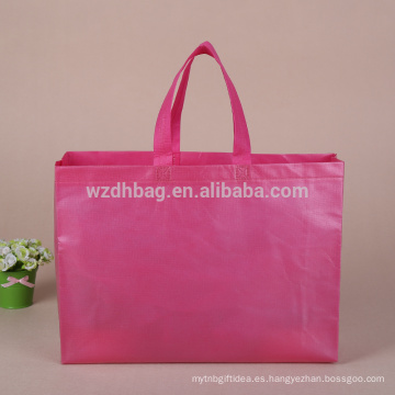 La bolsa de asas no tejida rosada en blanco llana de los PP, bolso de compras no tejido de la laminación
